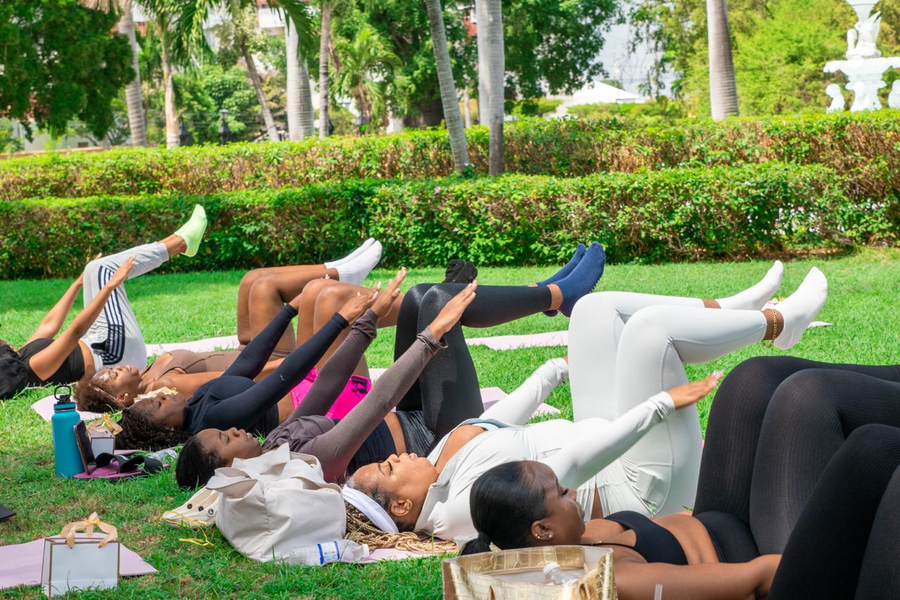 Pilates session in outdoor garden setting
